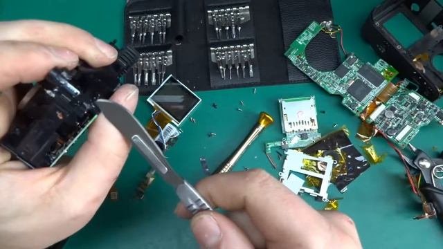 HP digital camera teardown (one way) - lenses, stepper, xenon tube and screws...