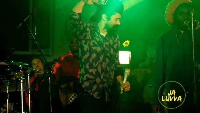 Damian Marley joins & embraces Chronixx onstage in gesture of solidarity