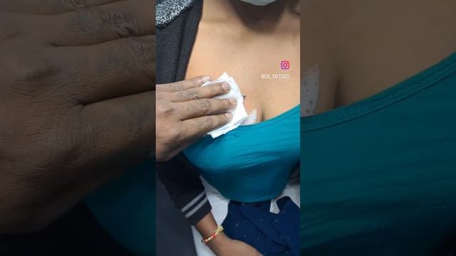 Girl chest tattoo