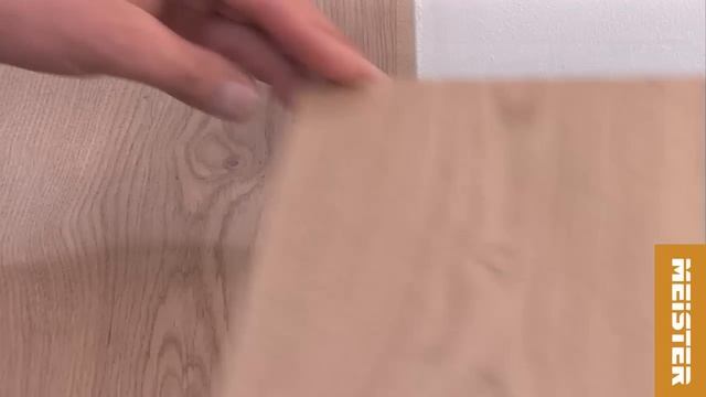 MEISTER | Perfekte Positionierung des Übergangprofils bei einer gefälzten Tür.