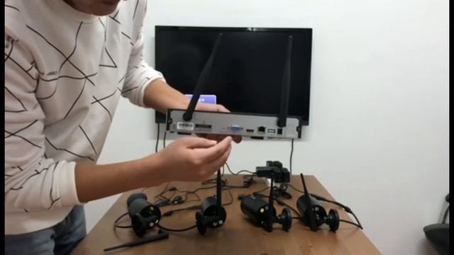 1 OOSSXX Введение и установка беспроводного комплекта видеонаблюденияNVR