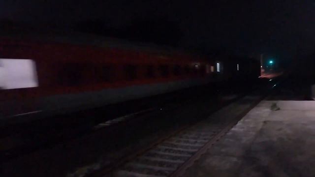 LATE NIGHT ACTION: MAHIMAGOSSAIN EXPRESS ZOOMING PAST JAKPUR
