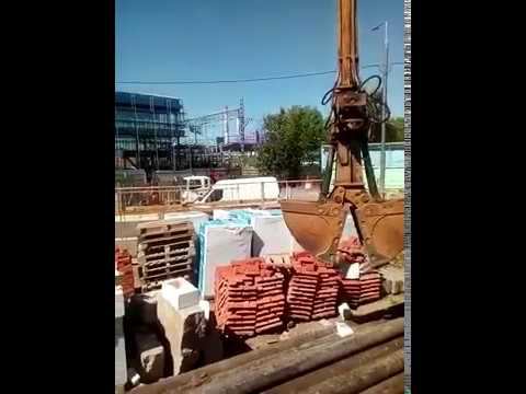 Колесный экскаватор с грейфером МосТрансАренда