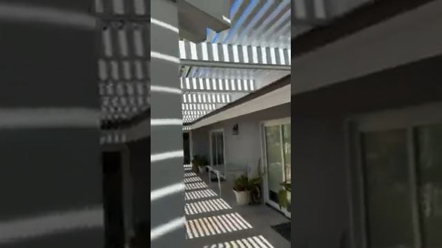 A new Alumawood Laguna Lattice pergola, with a roof mount adding height on the open-top patio cover