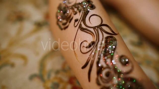 Mehndi. Henna pattern on models foot
