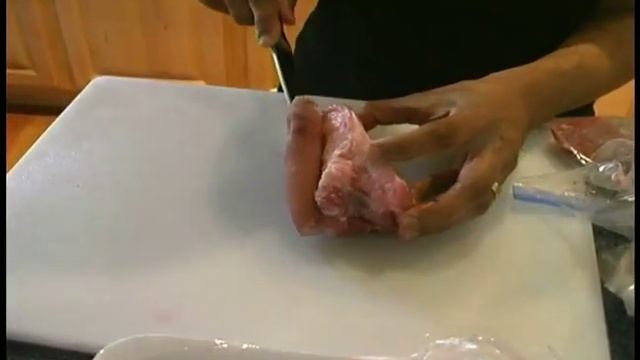 How To Make Spanish Split Pea Soup : Cutting Ham Hocks for Spanish Split Pea Soup