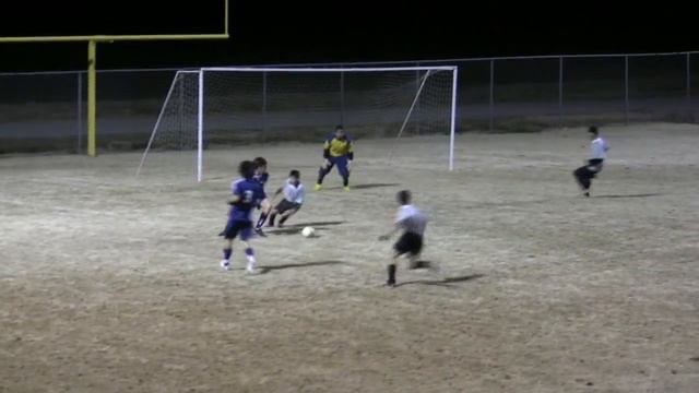 Evan scores his first of two against Tanner.