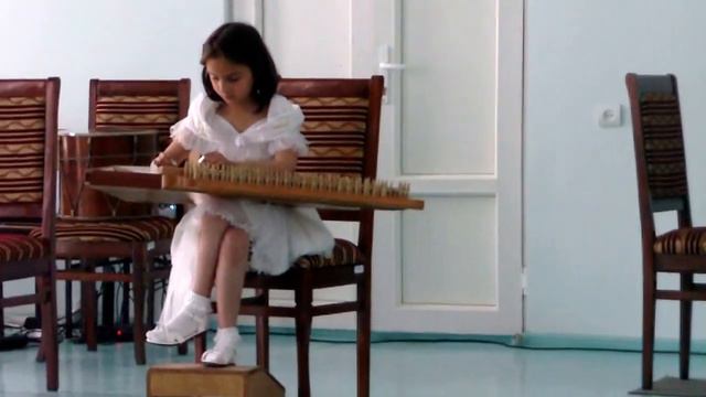 My daughter Anna plays on Armenian music instrument - qanon.