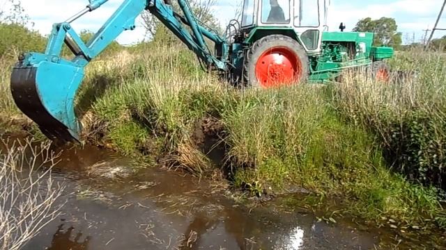 УЧУСЬ КОПАТЬ НА ЮМЗ