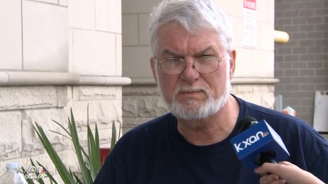Protesters greet president outside Austin Music Hall