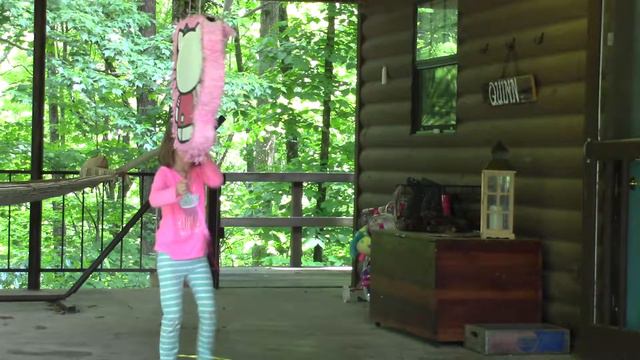 Kennedy Breaking a Pinata