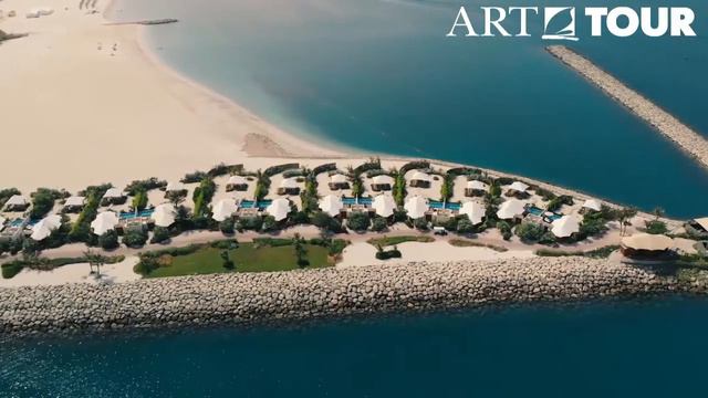 Beachfront luxury awaits at this island inspired retreat along the coast of Ras Al Khaimah