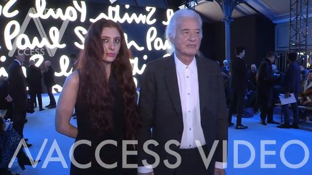 Jimmy Page and Scarlett Sabet front row at Paul Smith Fashion Show