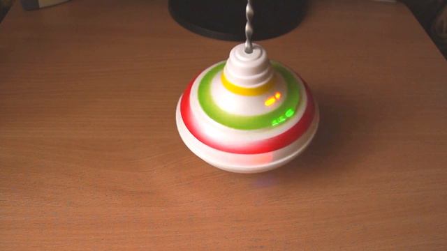 Детская игрушка музыкальная юла