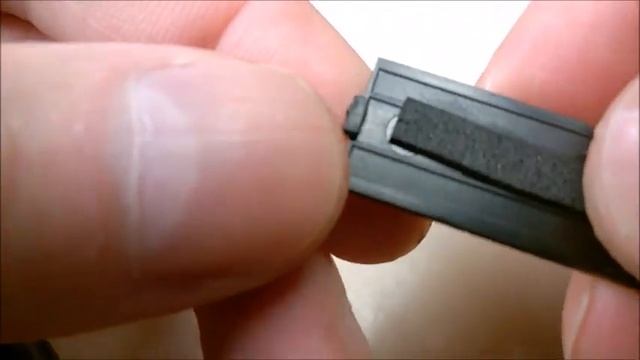 Action camera battery door removal