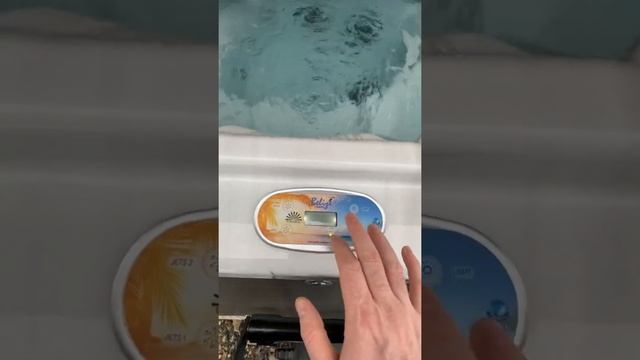 How to turn the temperature up and down on the hot tub