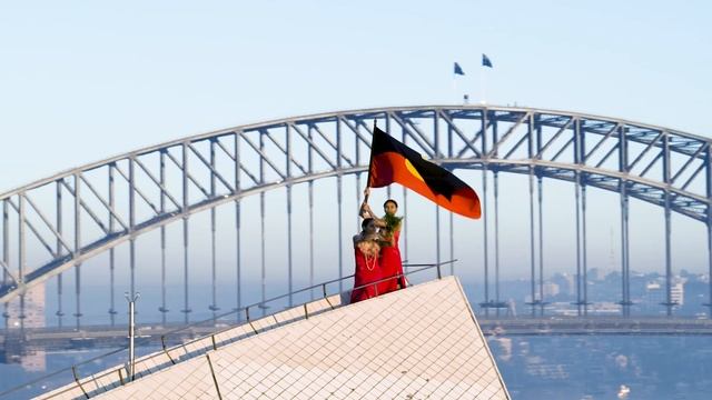 First Nations dancers fly the Aboriginal flag on Sydney Opera House | Dance Rites 2019