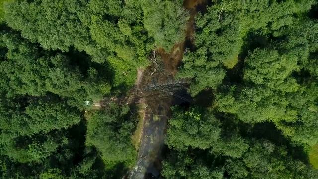 mixkit-aerial-rotating-view-of-jeep-crossing-river-in-jungle-49336-hd-ready