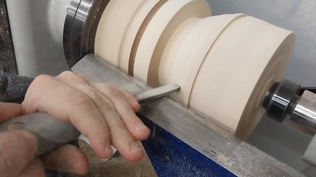 Сын учится токарным работам.