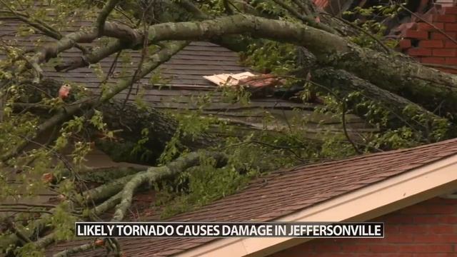 Residents survey damage after possible tornado moves through Jeffersonville, Indiana Tuesday evenin