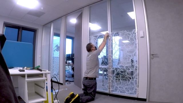 Installation of the Ripple decorative window film by Solar Screen