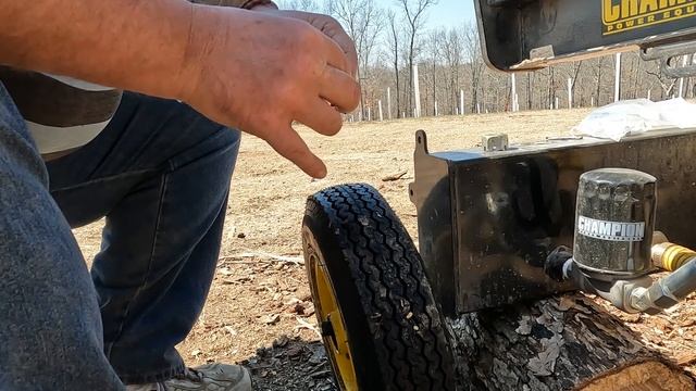 I ran over what with the Dresser Track Loader - Packing wheel bearings in the Champion Log Splitter