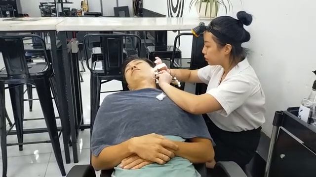 Professional relaxing earwax removal service, girl with top skills (1).mp4