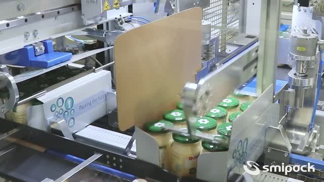 Упаковка стеклянных банок в картонную коробку на автомате Smipack мод. WPS 150 D-S