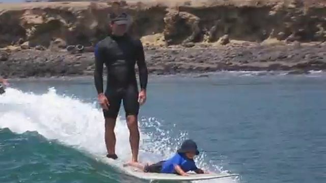 Beau and Lianne Surfing with their 2 Year Old Son Clint