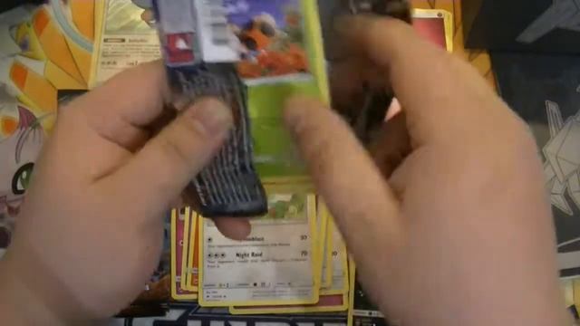 Opening Necrozma Elite Trainer Box.