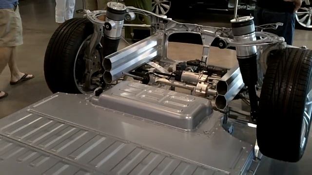 Tesla S battery pack, chassis and drivetrain - closeup - lithium ion battery pack and motor