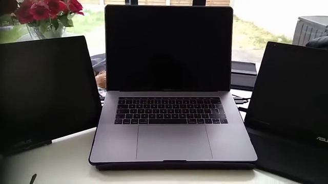 Macbook Pro with 2 external Asus MB169C+ screens running Steam on Windows using an external SSD