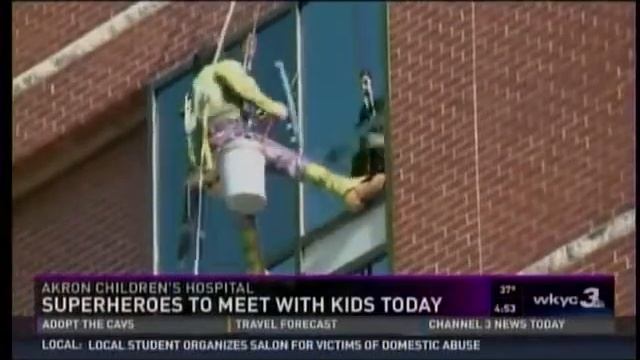 Superheroes Wash Windows at Akron Children's Hospital