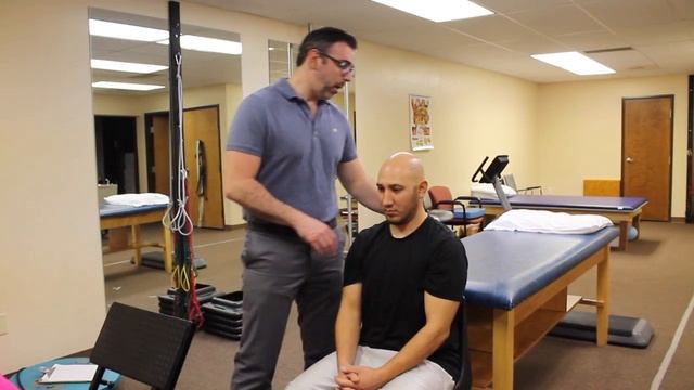 Stretch your Upper Back while Seated - Applied Physical Medicine | Tygiel Physical Therapy