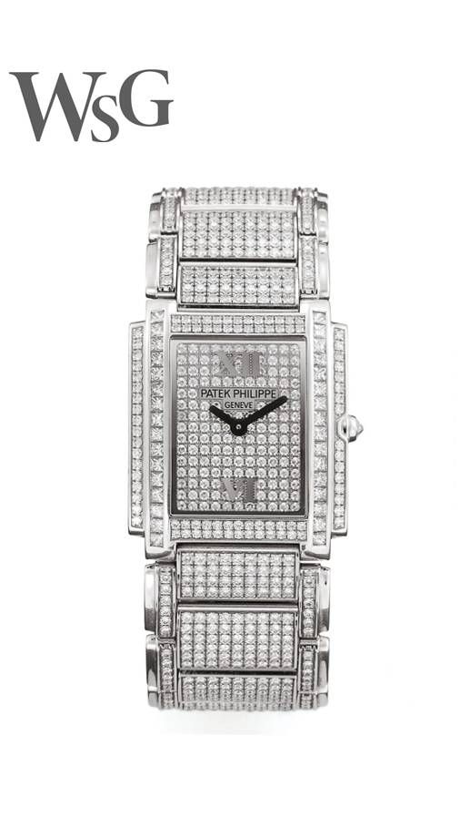 Инкрустация часов Patek Philippe в Москве. Безупречное качество ручной закрепки бриллиантов.