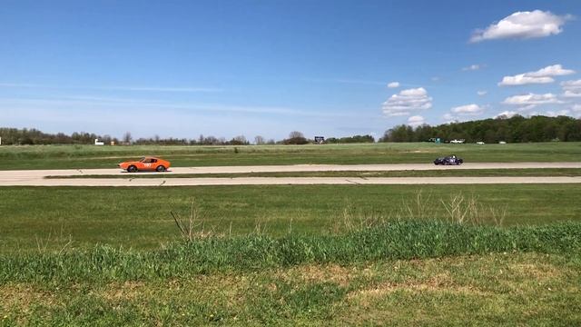 SAAB Sonett #197 pulls narrow lead on Bugeye Sprite #757 at Gingerman 2021