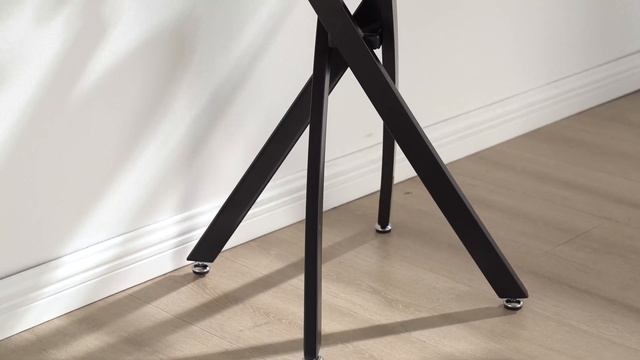 Leonardo Tempered Glass and Black Leg Dining Table from Furniturebox UK