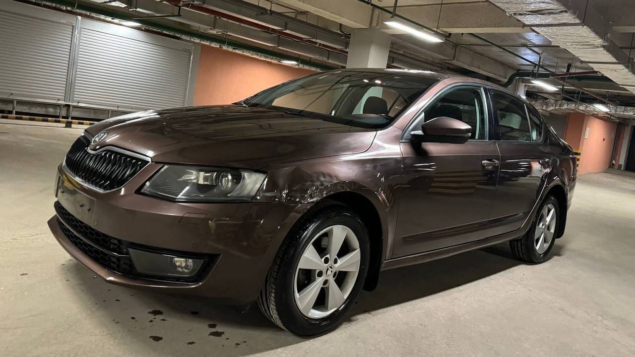 Skoda Octavia; 1,4 AT; 2014; Коричневый