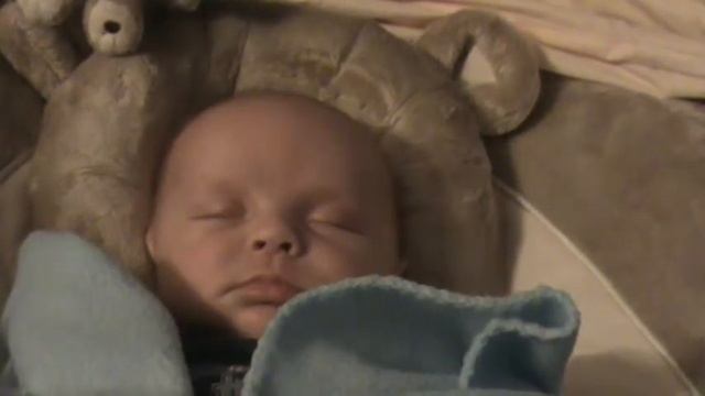 Owen sleepy in bear seat (12/1/2008)