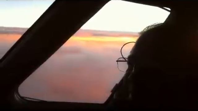 Sun rise under the clouds at FL280