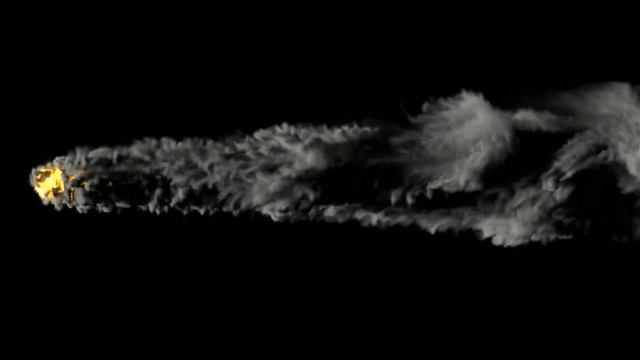 Rocket engine flames burst out with black smoke and fire on a dark background