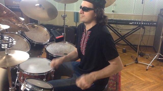 Warming up before the drums recording session in the studio