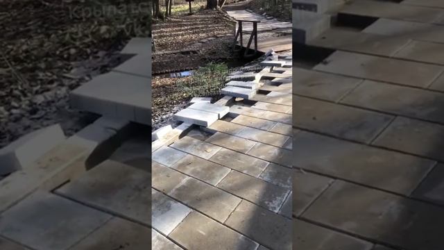 В овраге на Крылатских холмах около родника начали класть бетонную плитку и бордюры