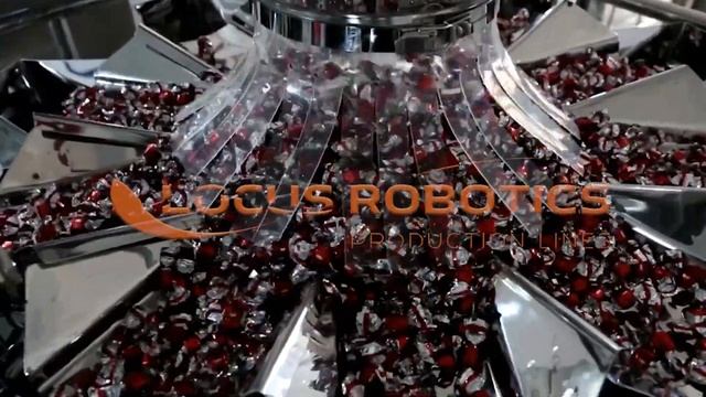 Вертикальная упаковочная машина для упаковки конфет во Flow-Pack LVP-50 с мультиголовой и элеватором