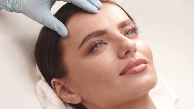 cosmetologist-checking-female-forehead-at-clinic-2023-11-27-05-24-50-utc.1731302373 (1)