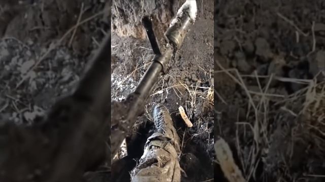 солдат в окопе после боя