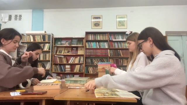 Ремонт книг.