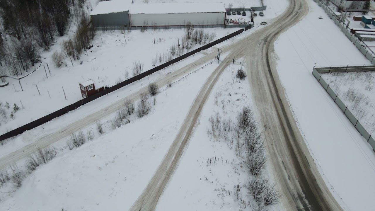 Снежная свалка на Комплектовочной ул в Сургуте