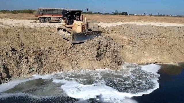 Строительство, засыпка, расширения дороги, один из прошлых объектов