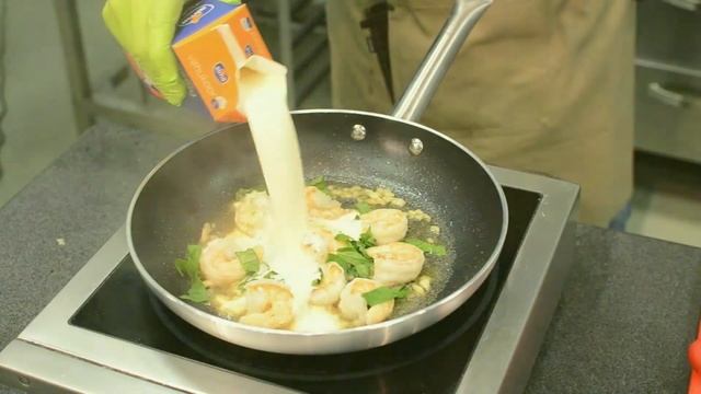 KIWI DIWI Recepte: Melnā pasta ar garnelēm